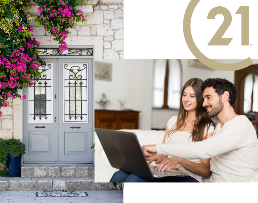 Quaint stone house entrance with gray double doors, decorative ironwork, and vibrant pink flowers in bloom